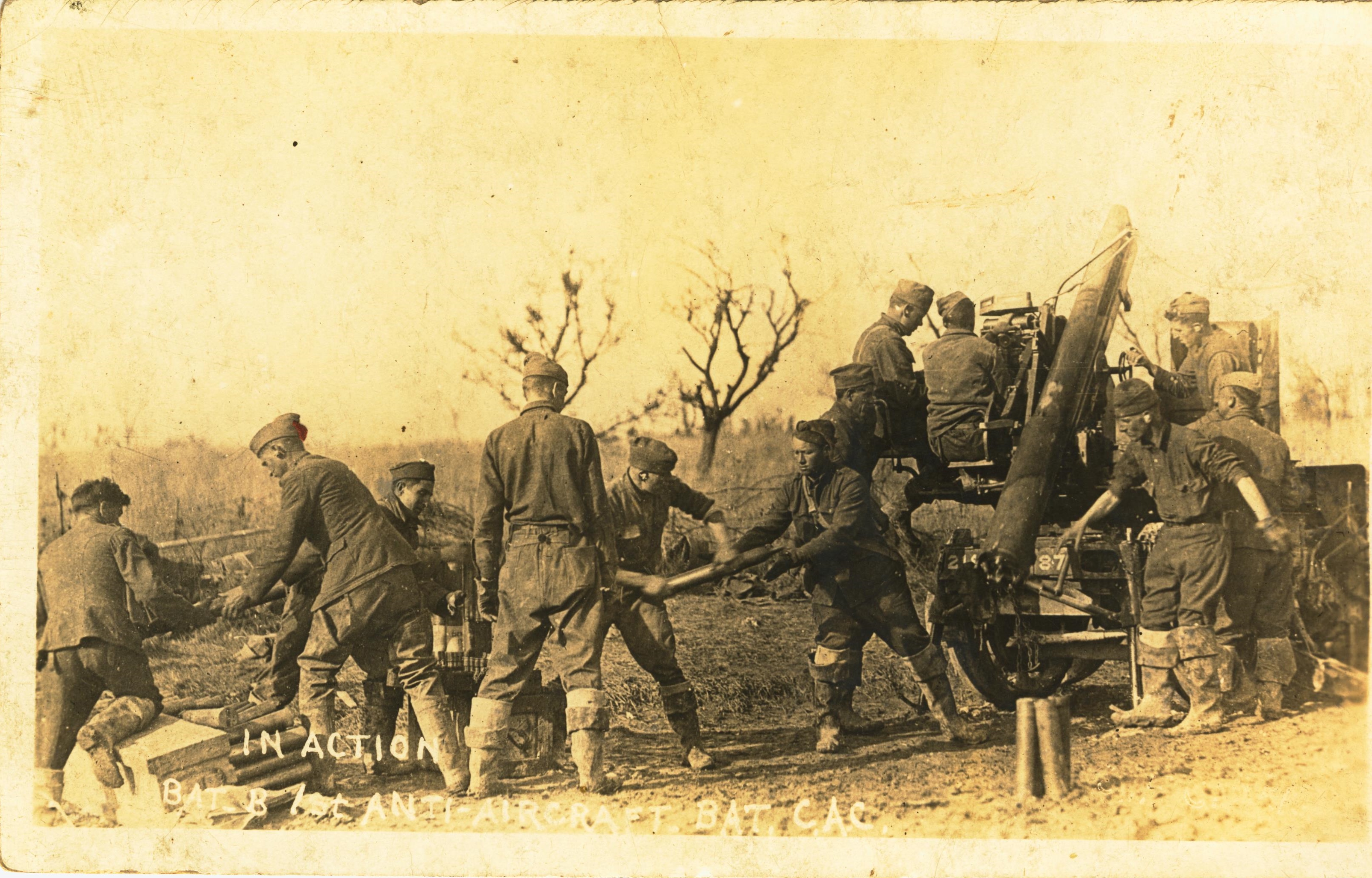In action Battery B 1st Anti-aircraft Batt CAC