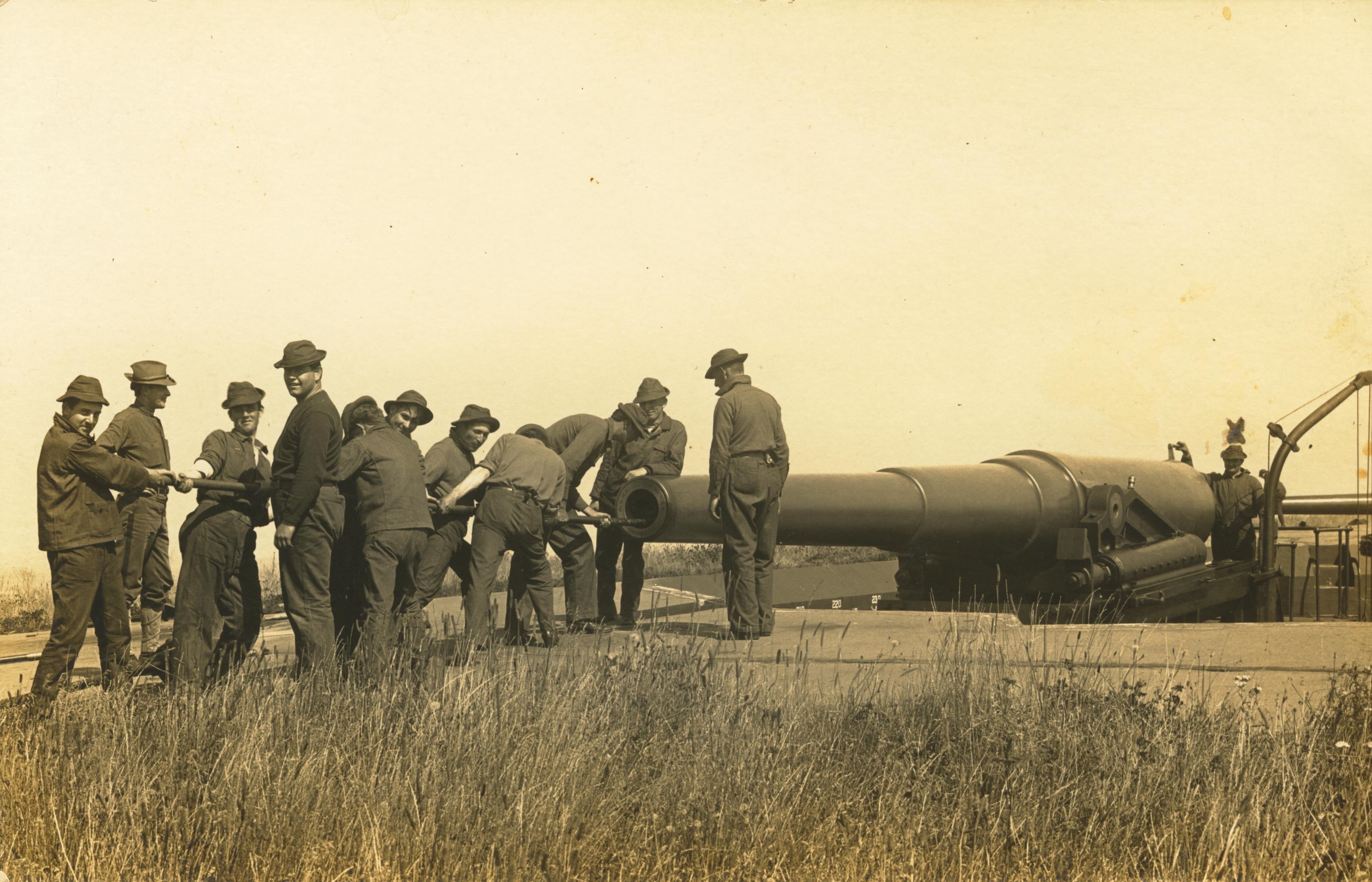 Cleaning 10 inch gun after target practice
