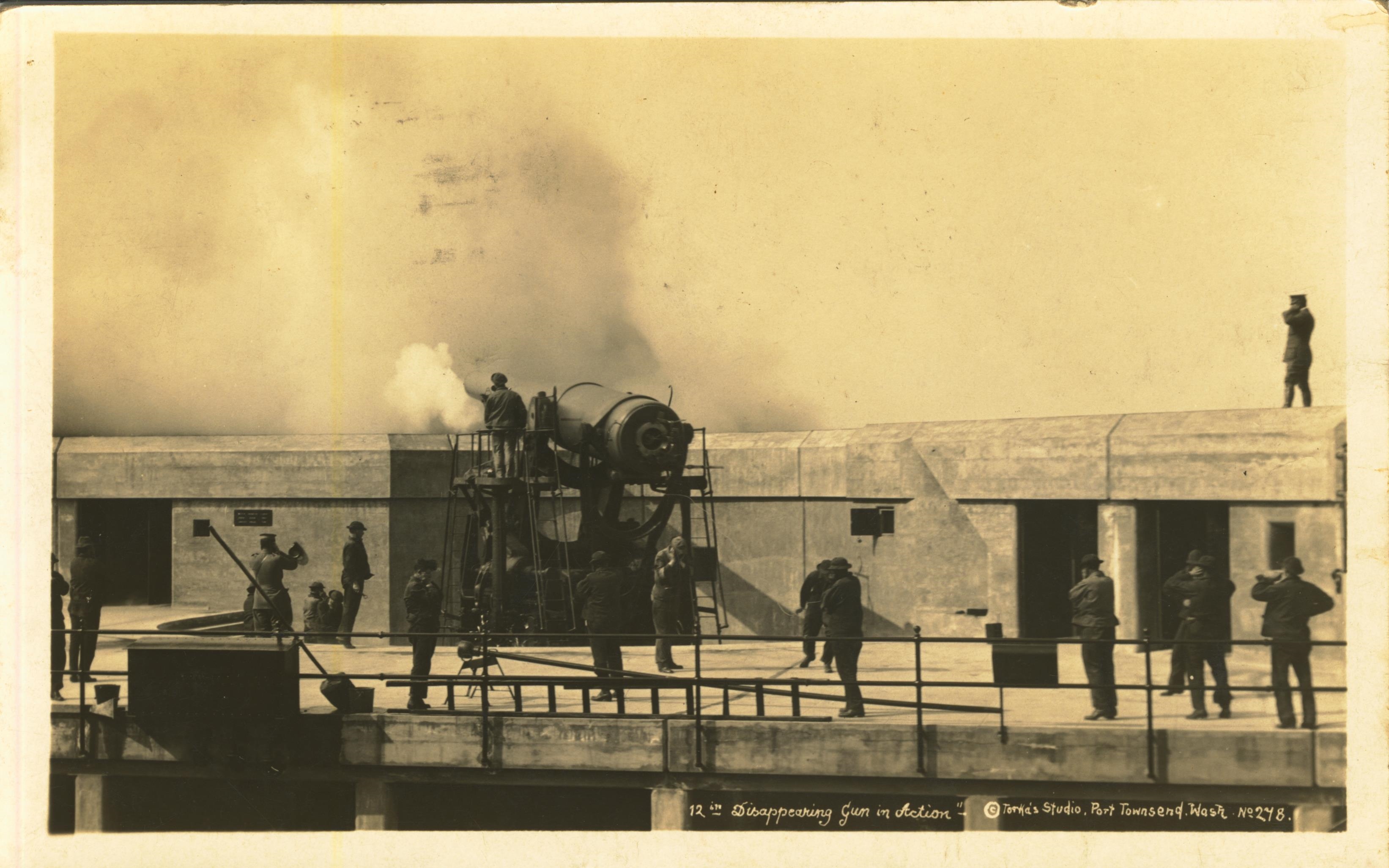 12 inch disappearing gun in action Torka's Studio Port Townsend Wash.