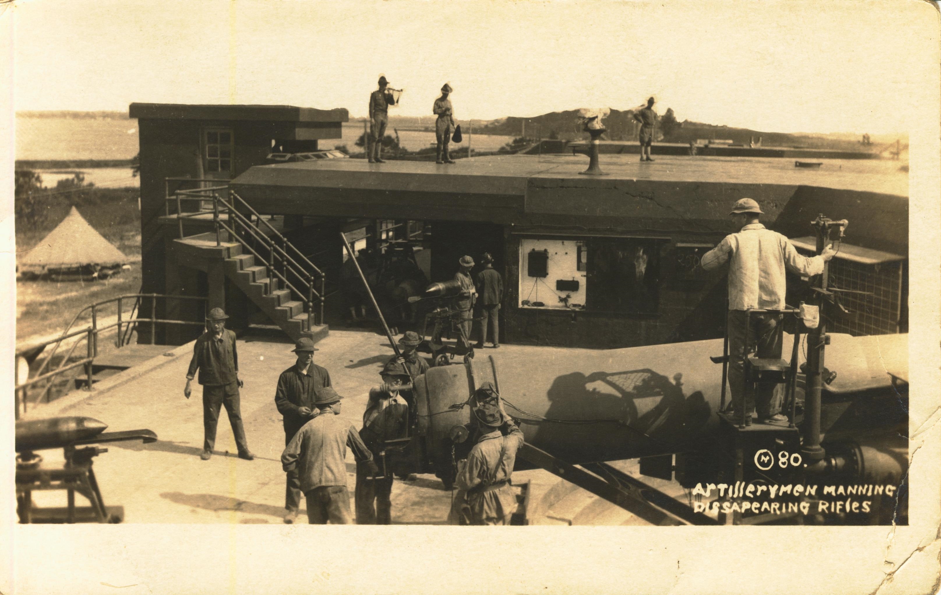 Artillerymen manning disappearing rifles back states at Fort Dupont Del Nichols Studio Delaware City Del