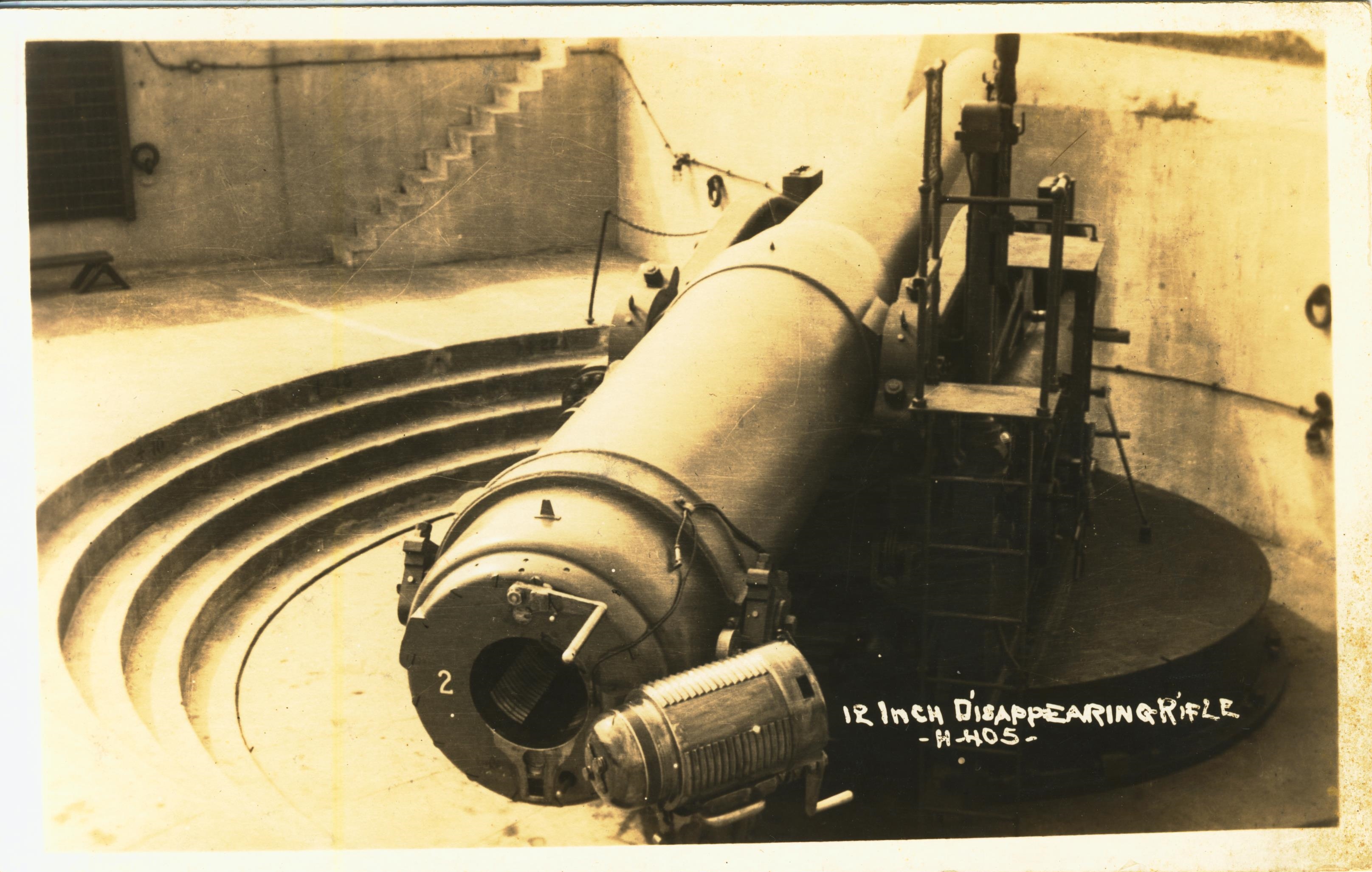 Open breech disappearing rifle