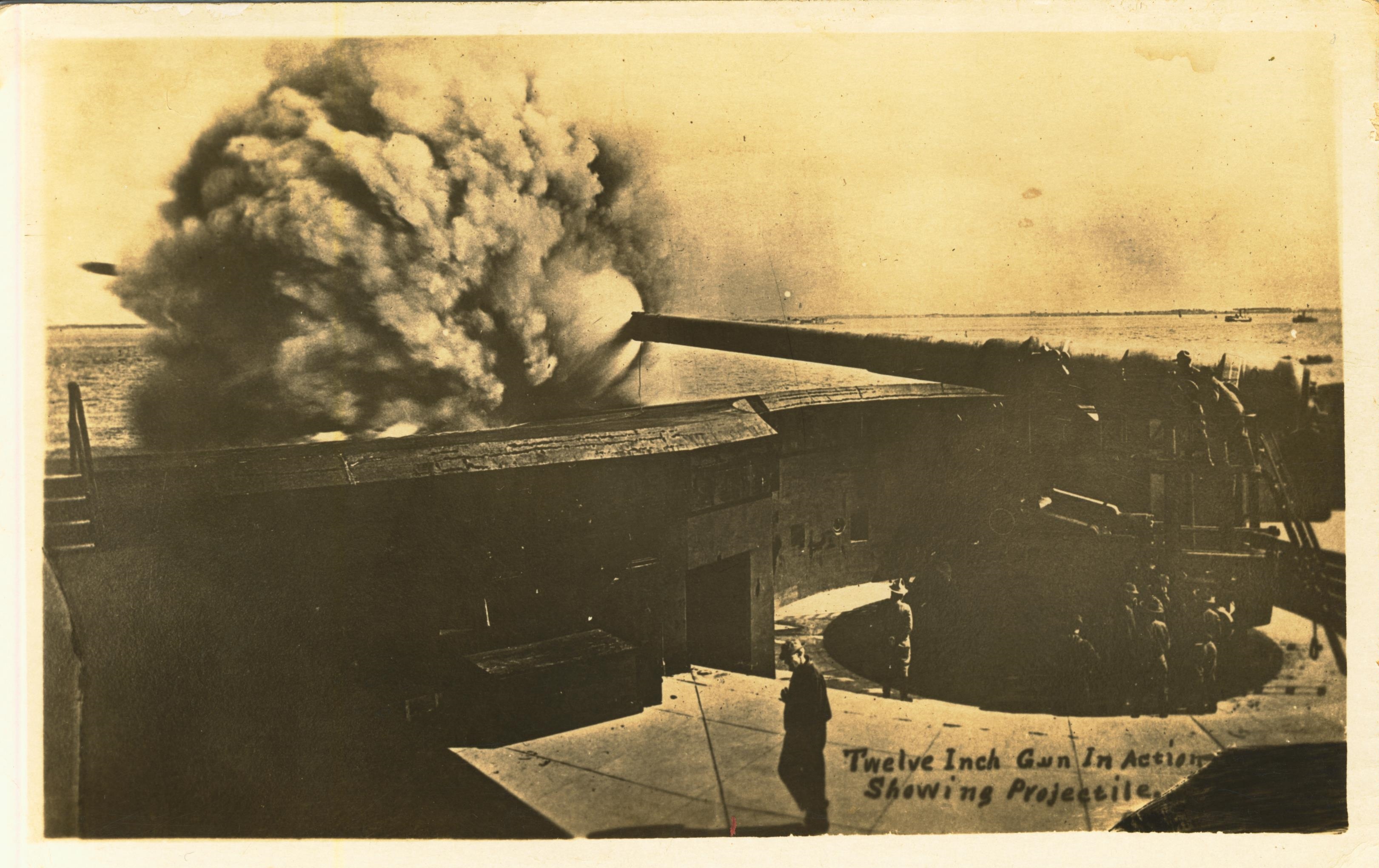 Twelve inch gun in action showing projectile
