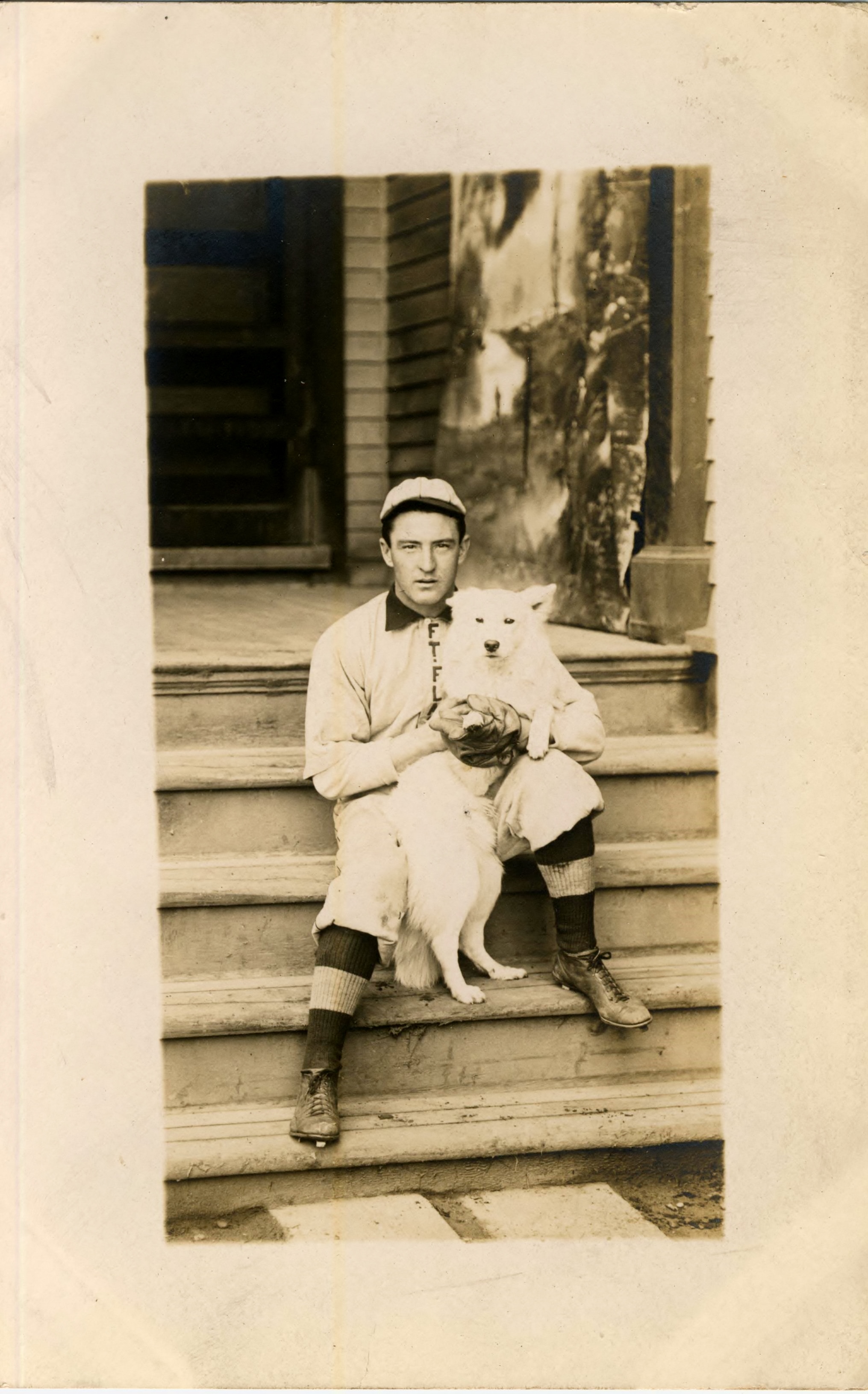 Fort Flagler Baseball Player and Dog