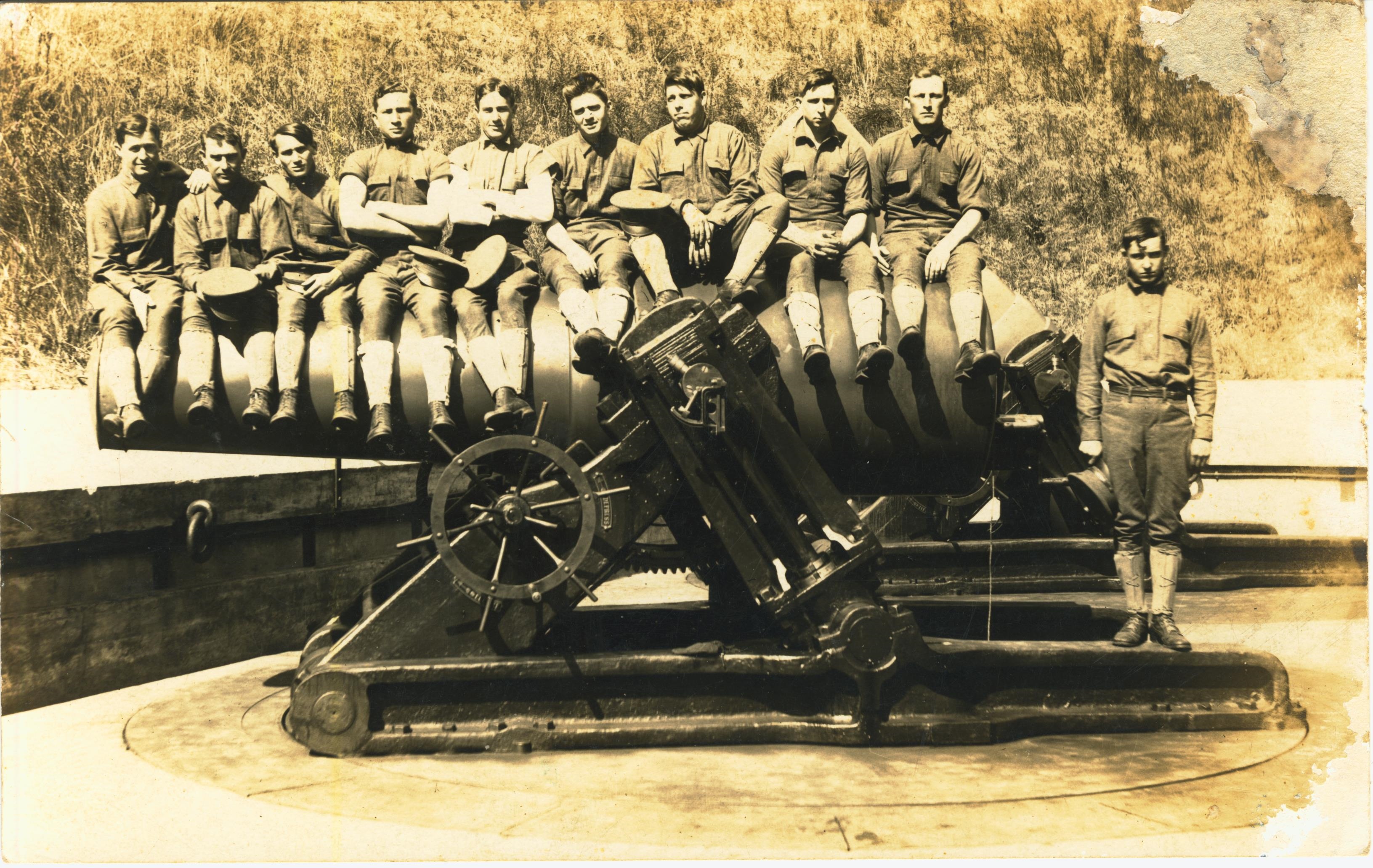 Soldiers sitting on mortar