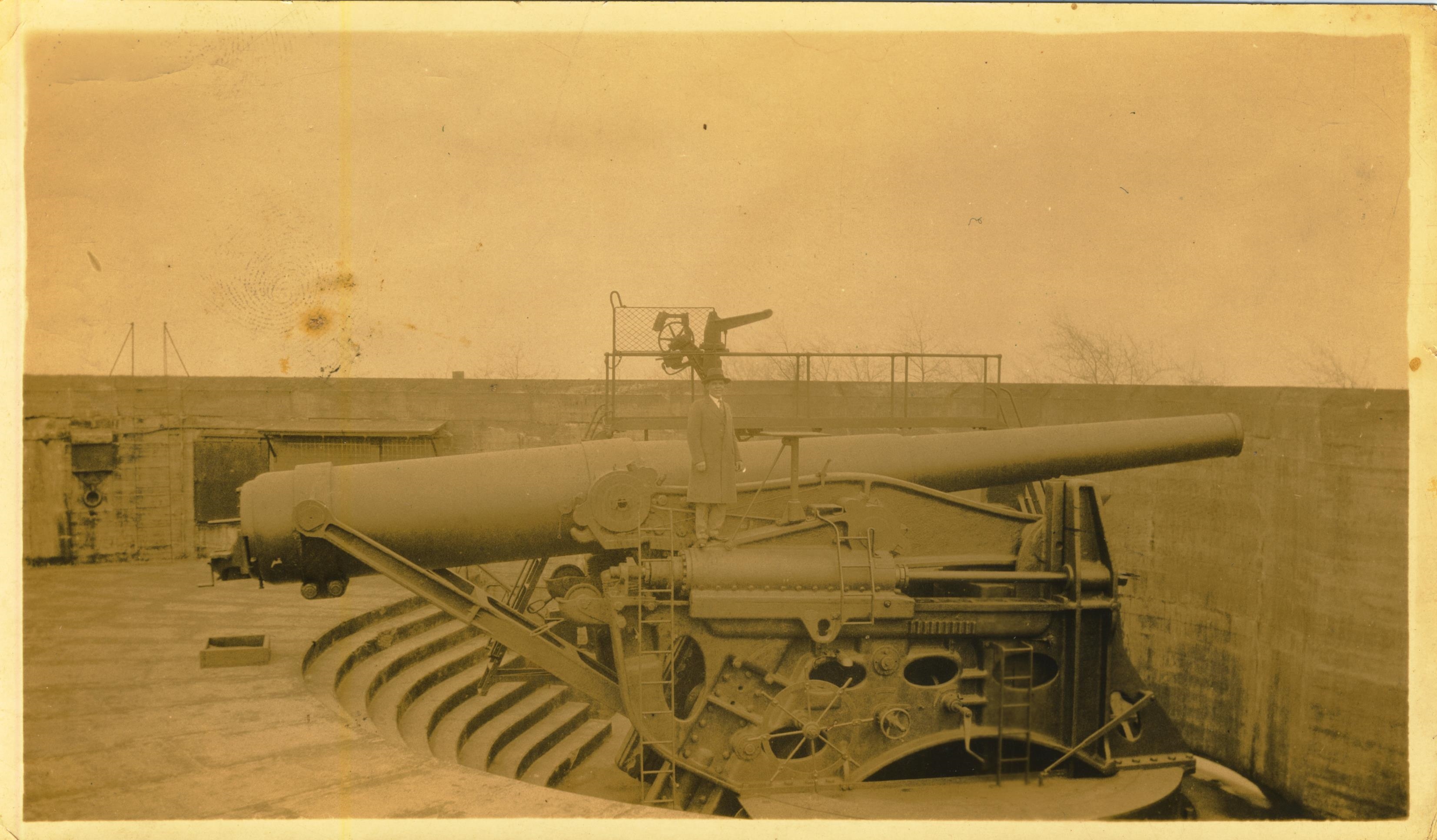Man on disappearing gun Staten Island written on back 2